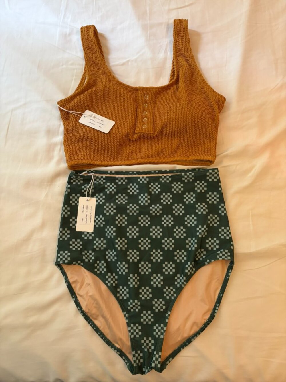 Two piece Livy & Kate swimsuit, size medium
